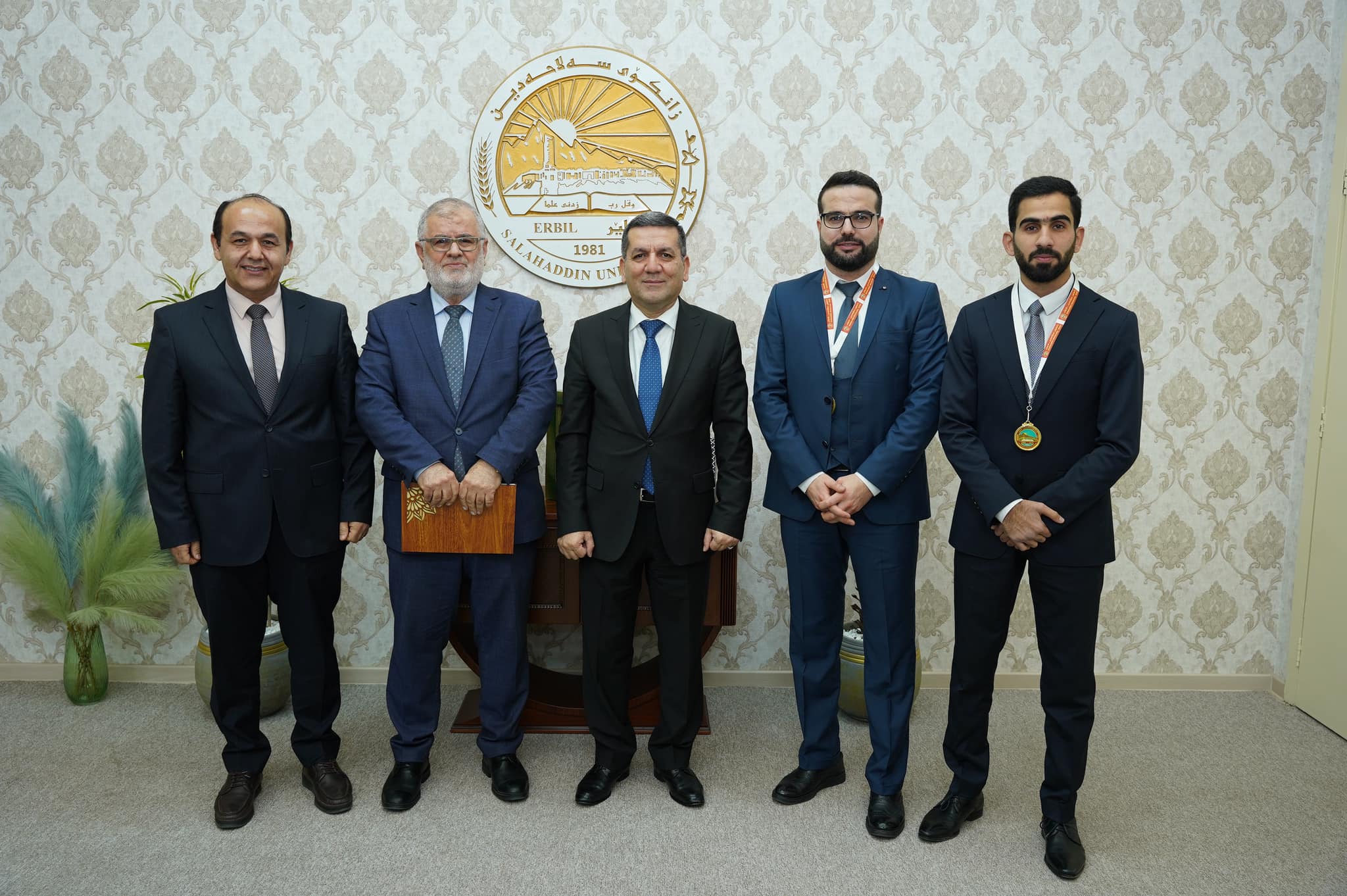 The president of Salahaddin University- Erbil expresses gratitude to a leading student and his supervisor.